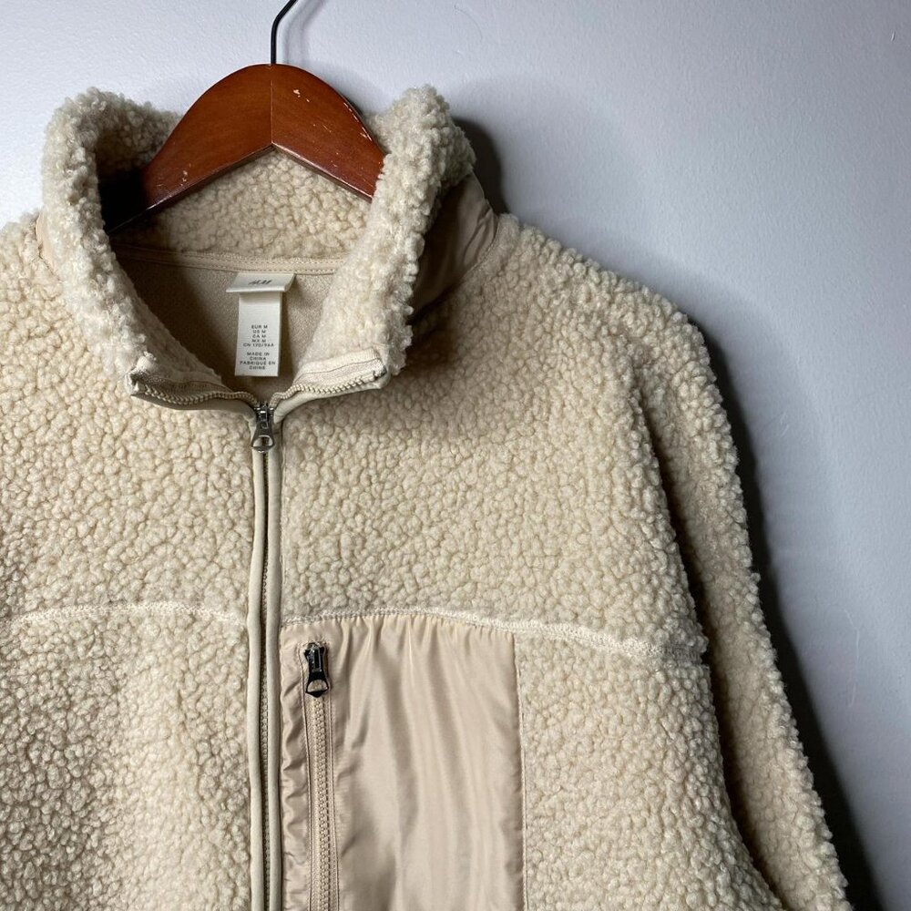 Cream fleece jacket with pockets size medium by H&M made in China